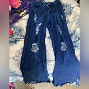 Flare dark blue jeans. Super stretchy. X-Large